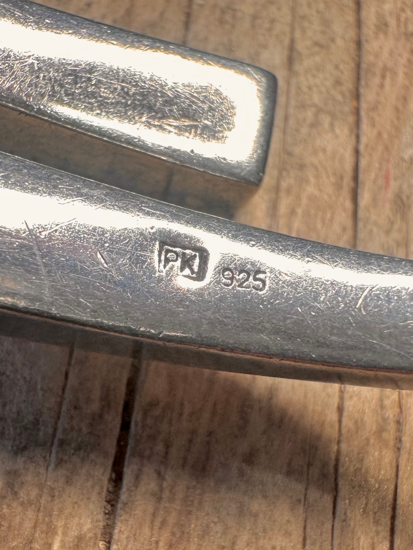 Abstract Overlapping 925 Sterling Silver Bangle