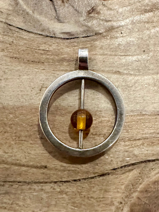 Abstract Circle Moving Orange Stone Silver Pendant