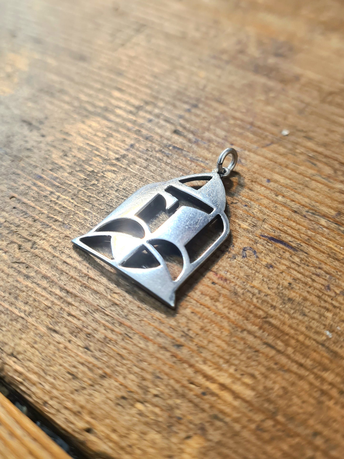 Abstract Cut Out Silver Pendant