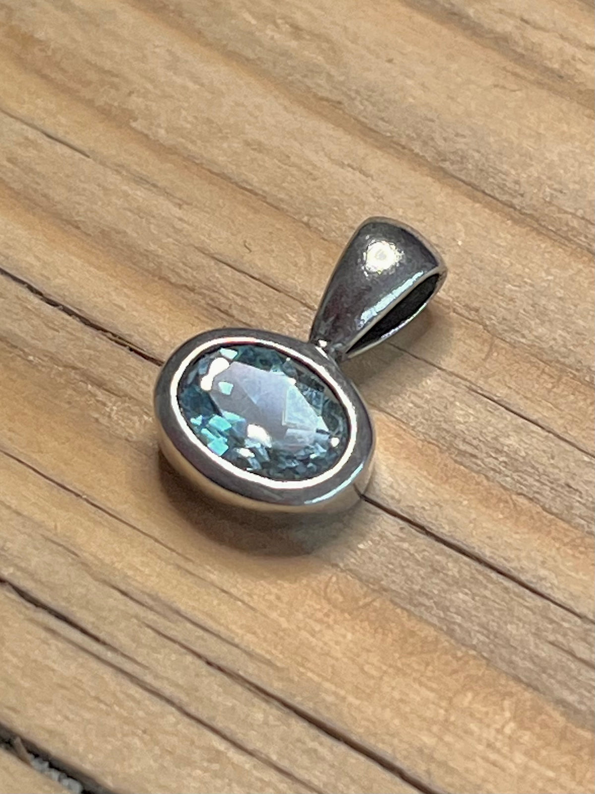 Small Oval Blue Topaz Maker NE 925 Sterling Silver Pendant