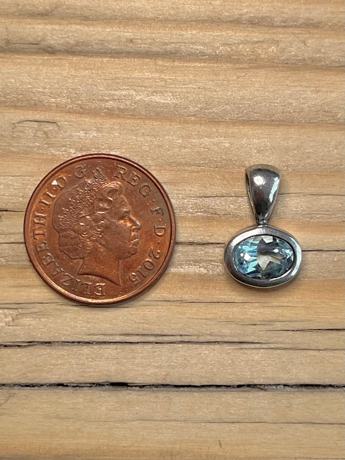 Small Oval Blue Topaz Maker NE 925 Sterling Silver Pendant