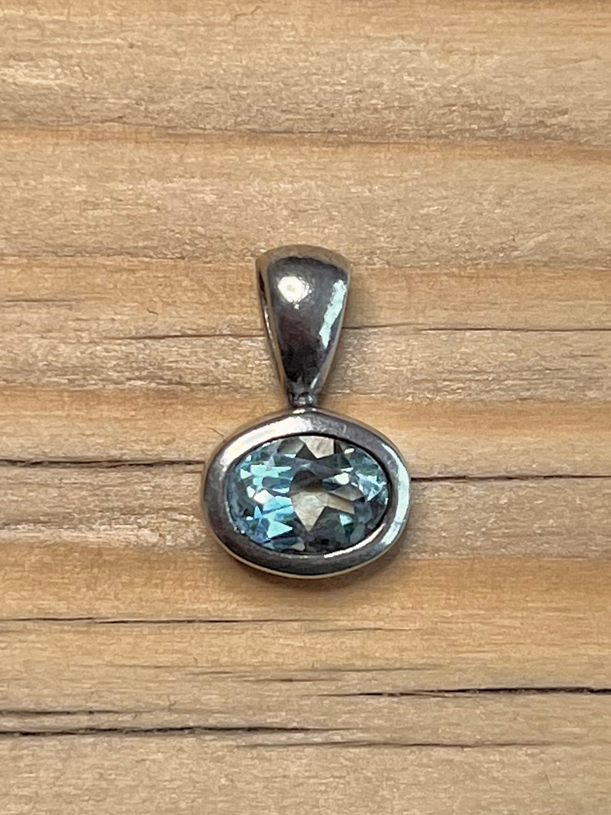 Small Oval Blue Topaz Maker NE 925 Sterling Silver Pendant